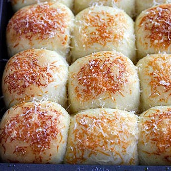 Cheesy Parker House Rolls