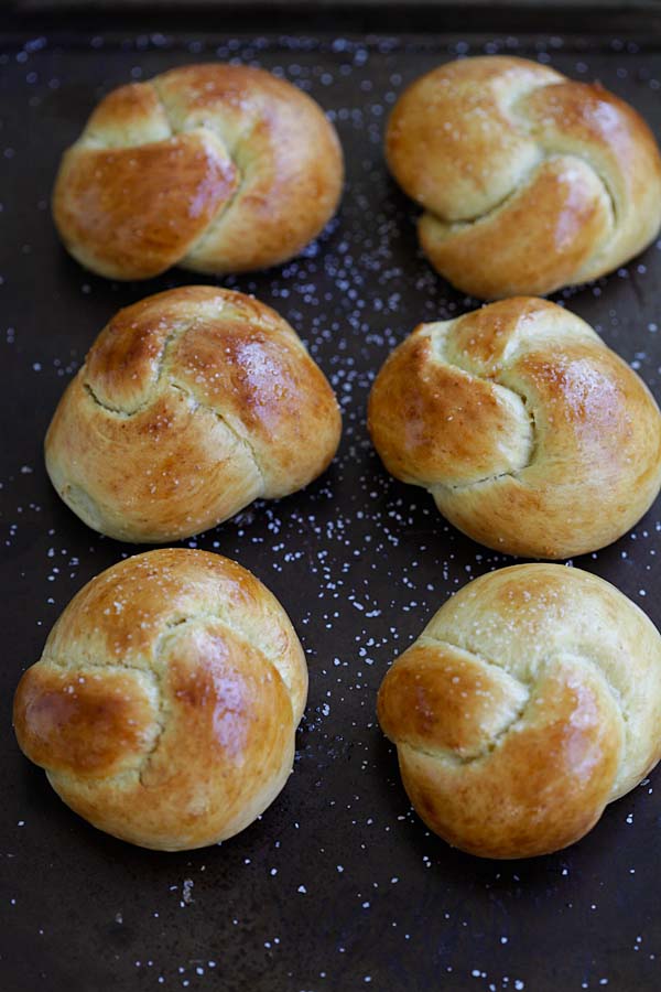 Soft yeast buns tied up in a knot ready to serve.