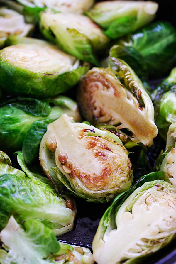 Close up healthy sauteed Brussels sprouts with honey and balsamic vinegar.