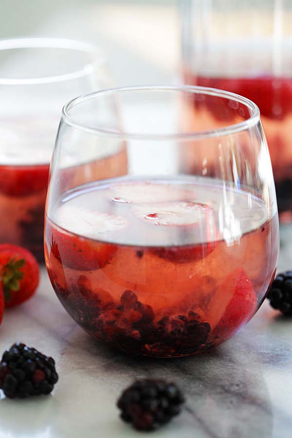 Rosé Sangria served in cocktail glasses, ready to serve.