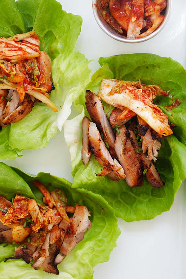 Easy and healthy delicious Korean lettuce wraps with spicy Korean grilled chicken and kimchi.