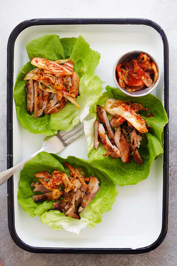 Easy and quick homemade Korean BBQ Chicken Kimchi Lettuce Wraps recipe.