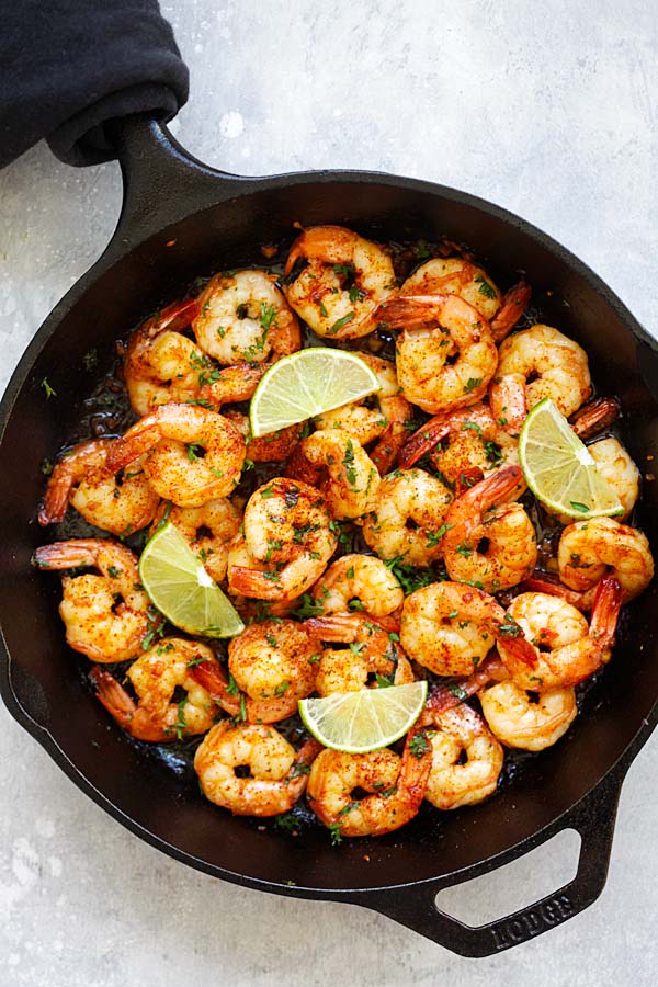 Easy skillet shrimp with smoky chipotle chili pepper, lime juice, honey and garlic.