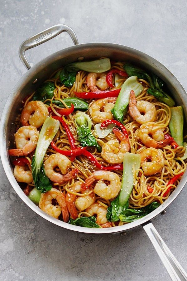 Stir fry Chinese egg noodles with shrimps and Asian greens.