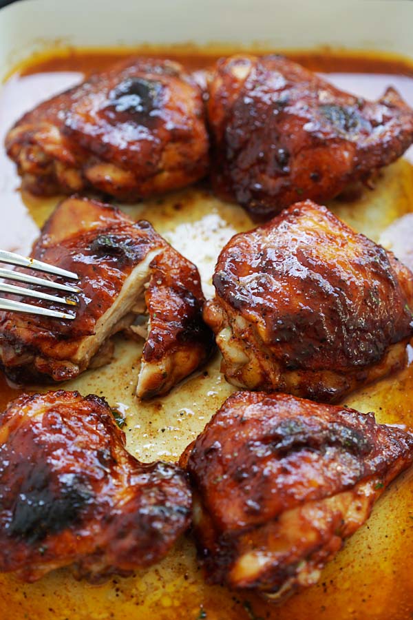 Easy and quick oven-baked chicken thighs marinated with smoky honey barbecue sauce.
