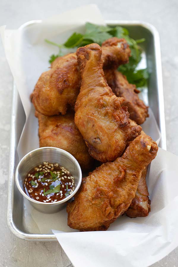 Malaysian shrimp paste fried chicken with a side of dipping sauce.
