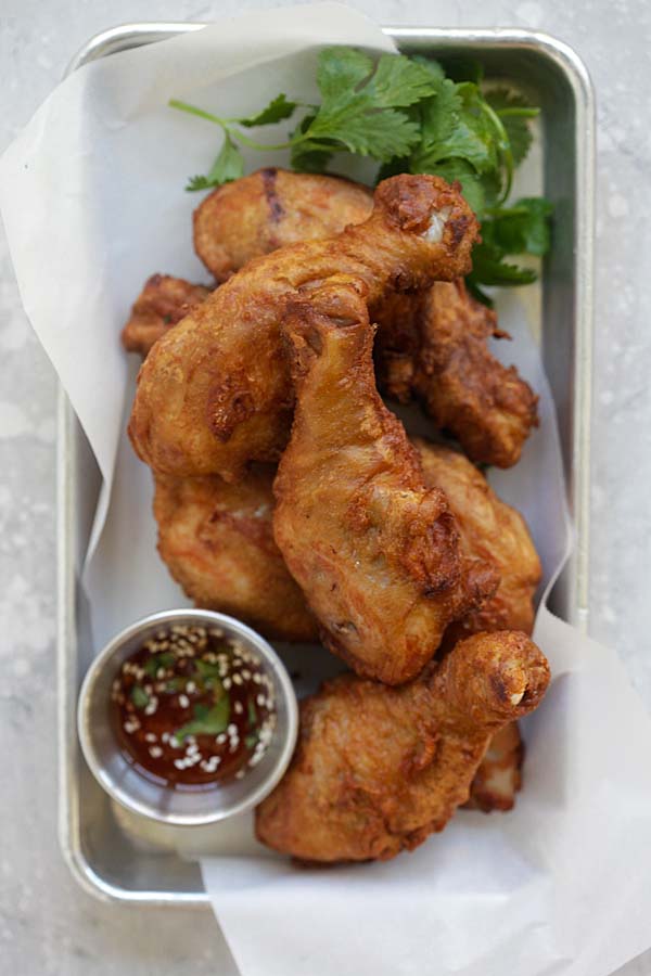 Belacan fried chicken marinated with cilantro and Asian seasonings.