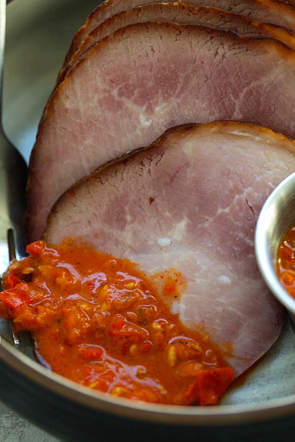 Close up of easy homemade Piri Piri Holiday Ham with homemade Piri Piri hot sauce.