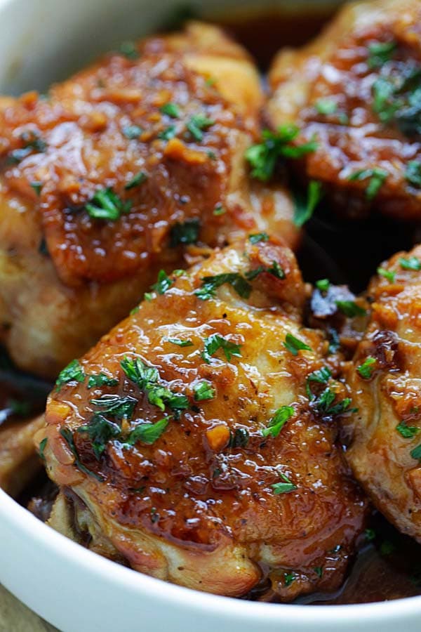 Easy instant pot honey garlic chicken garnished with parsley. 