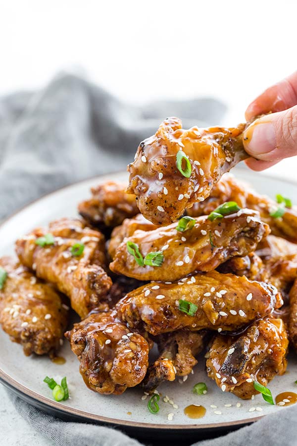 Teriyaki Chicken Wings covered in sticky sweet and savory teriyaki sauce.