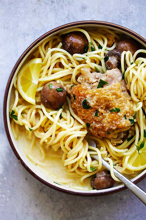Garlic chicken with mushroom and creamy sauce and spaghetti.