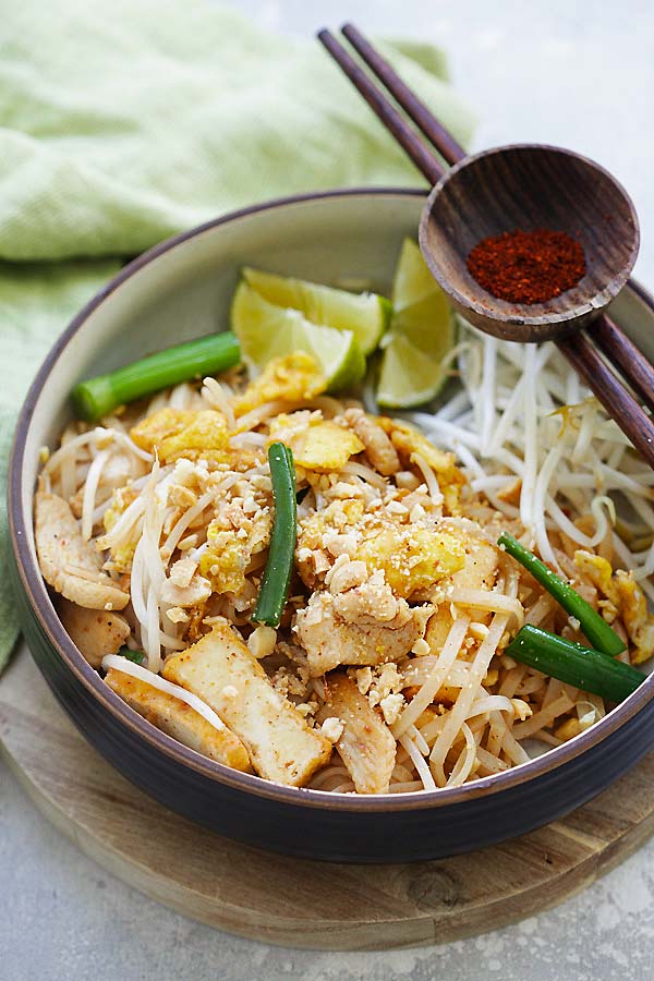 Stir-fry Thai rice noodles with chicken breast, fried tofu, Thai rice noodles (rice sticks) and Pad Thai sauce.