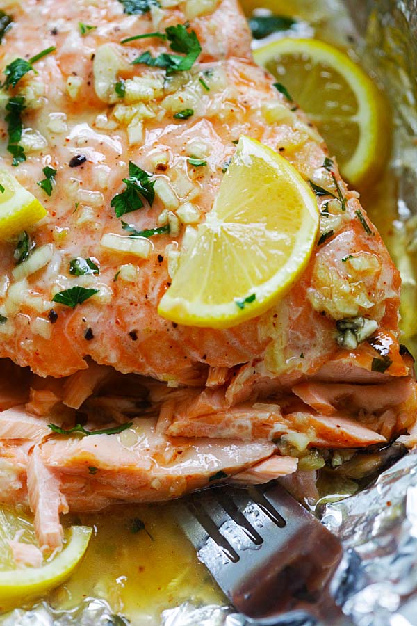 Delicious Honey Garlic Butter Salmon ready to serve on foil sheet.