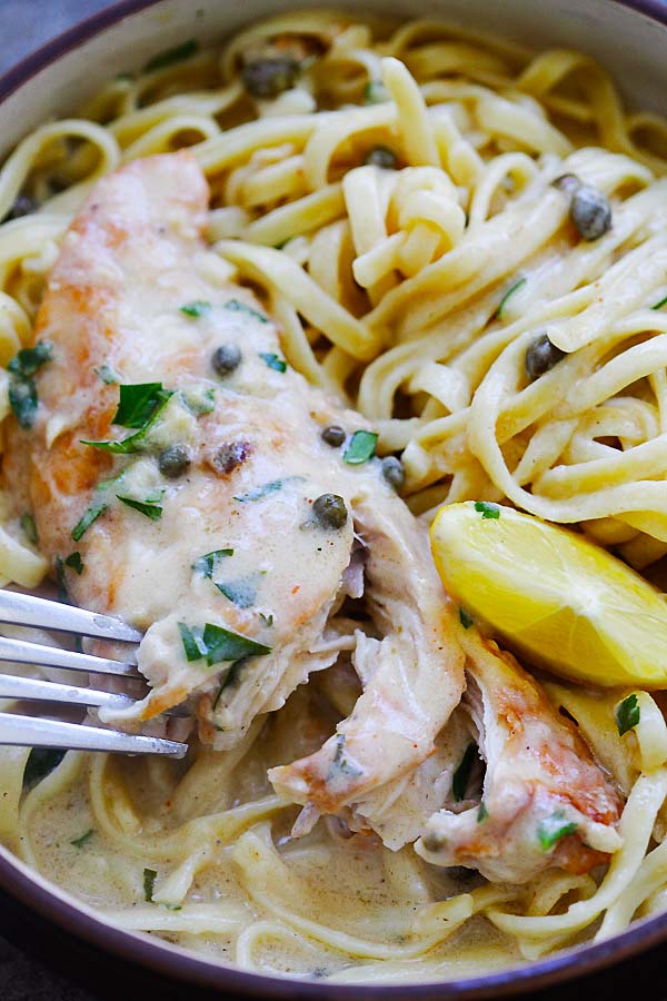 Instant Pot Creamy Chicken Piccata pasta in lemon butter Piccata sauce on a serving dish ready to serve.