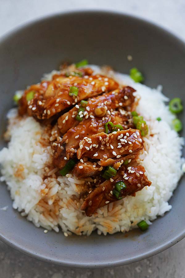 Instant Pot chicken with honey sesame sauce, on top of steamed rice.