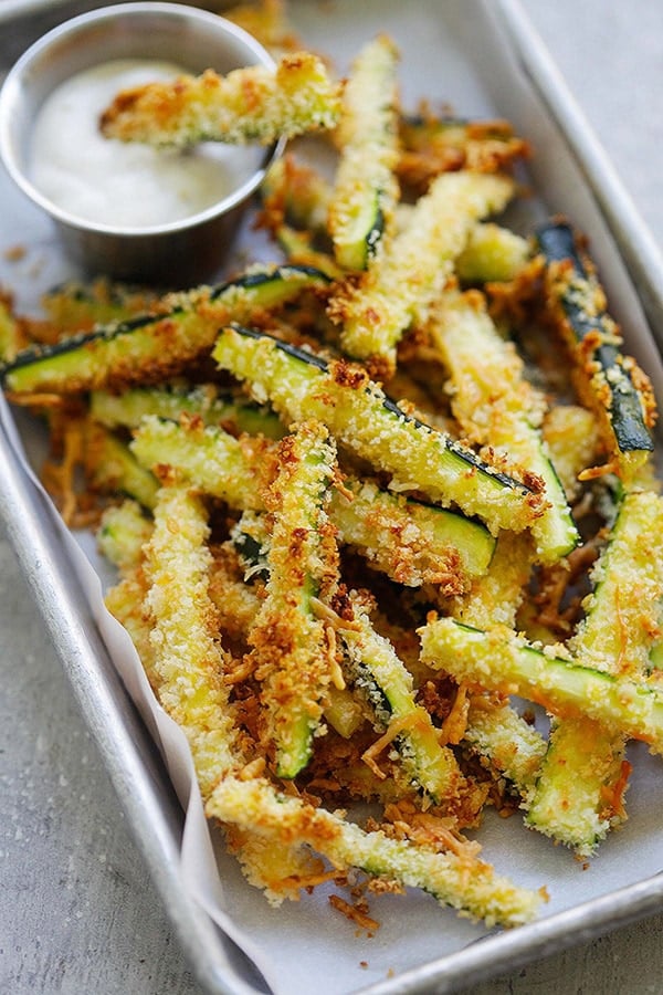 Parmesan zucchini fries on a serving platter, ready to serve.