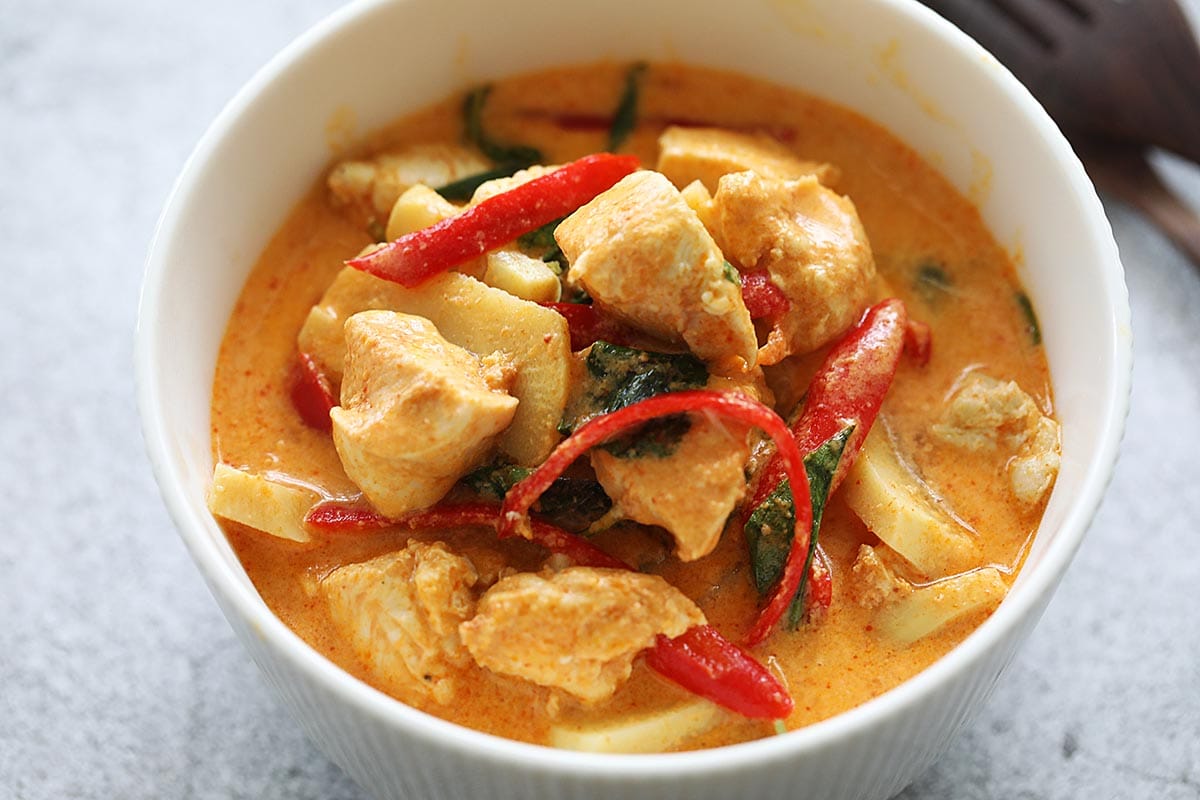 Thai red curry chicken, ready to serve with steamed rice.