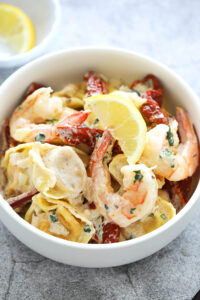 Quick and easy shrimp tortellini with garlic sauce with garlic sauce.