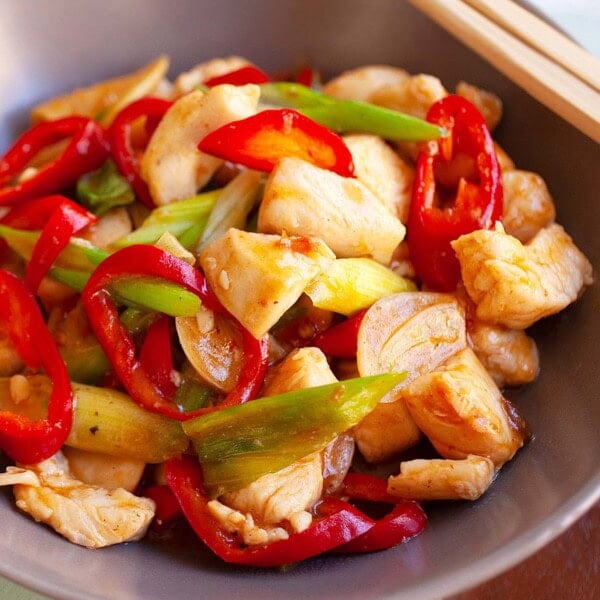 Easy spicy chicken stir fry recipe with diced chicken breasts, red chilies, scallions in a spicy douban bean sauce.