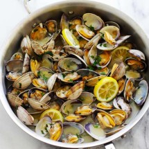 skillet of steamed clams in beer