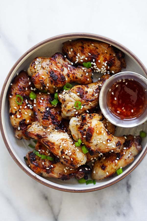 Grilled chicken wings marinated with Chinese five spice powder, ready to serve.