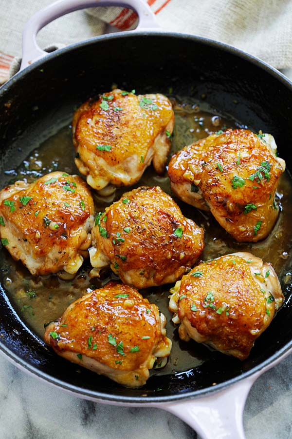 Easy one pot sauteed chicken thighs cooked with brown sugar and garlic butter in a skillet.