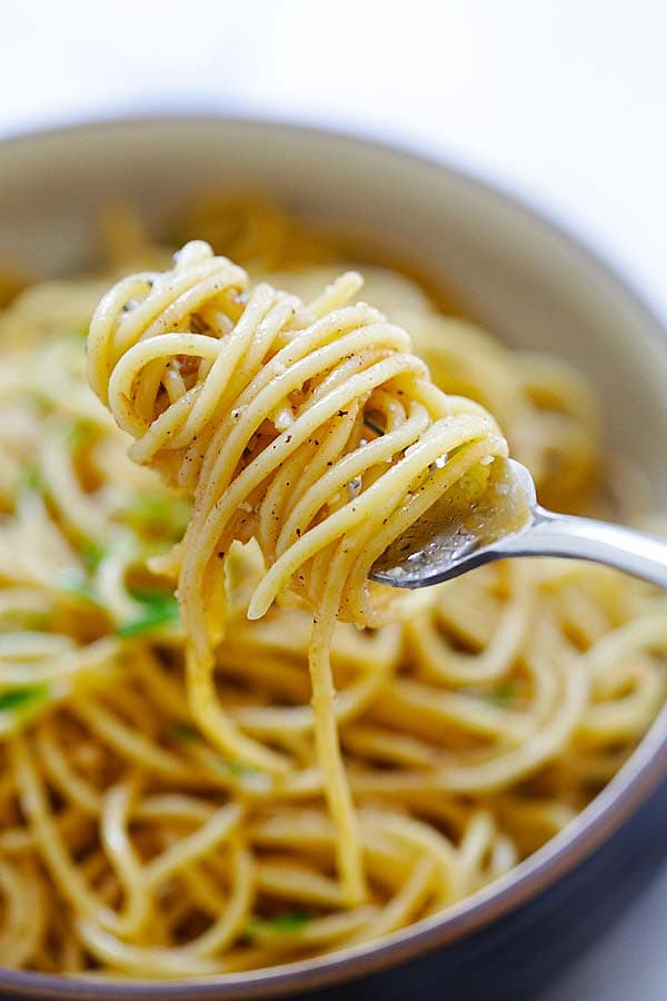 Brown Butter Garlic Noodles twirled on a fork.