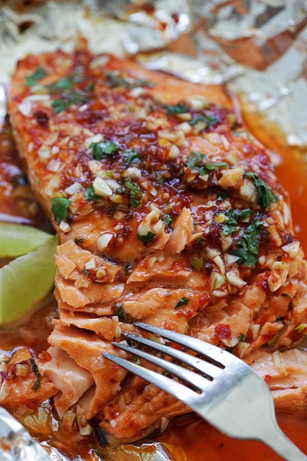 Easy and quick oven baked salmon fillet with homemade chili garlic sauce.