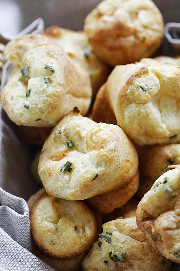 Easy and quick Parmesan-Chive popovers served in a basket.