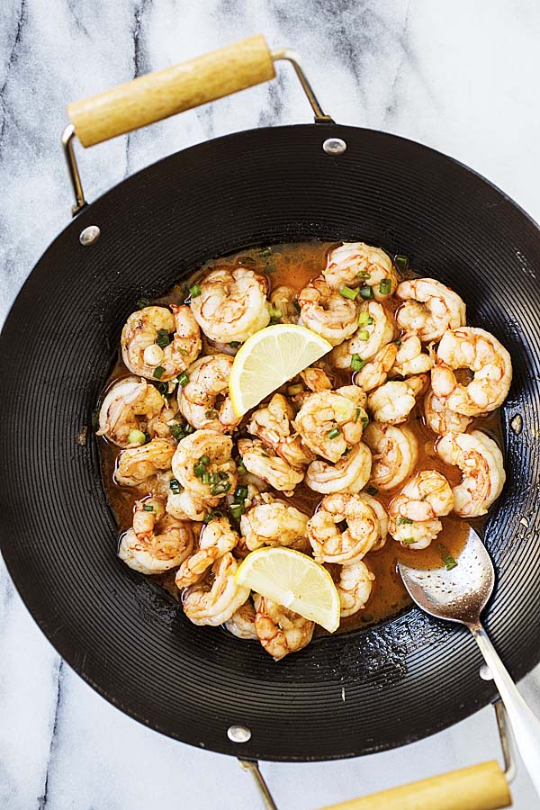 Garlic butter shrimp with red sauce with Asian flavors.