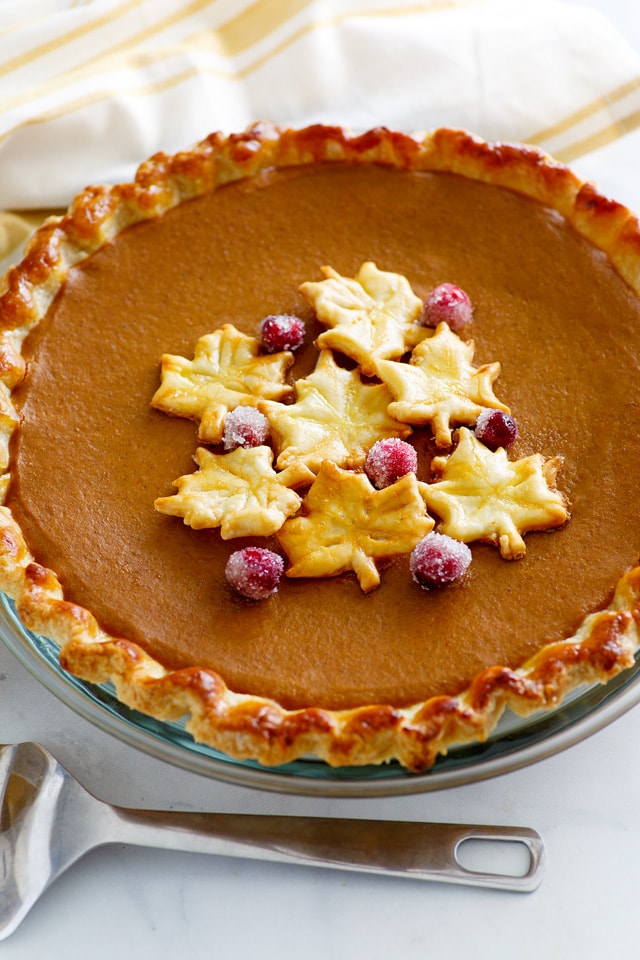 Pumpkin Pie in 9-inch pie plate on a dining table.