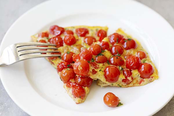 Cherry Tomato Frittata cut into wedges.