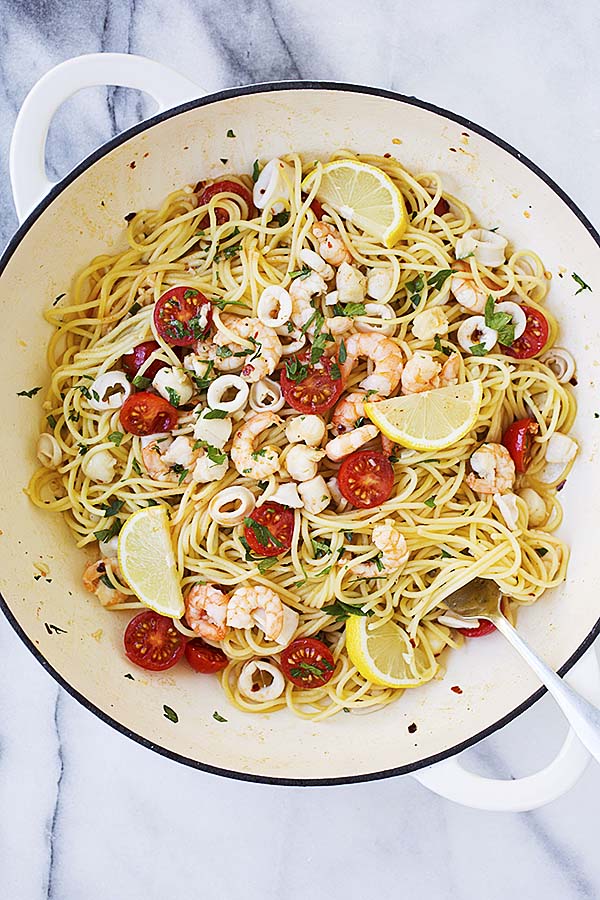One-pan seafood scampi spaghetti pasta with lemon and butter sauce.