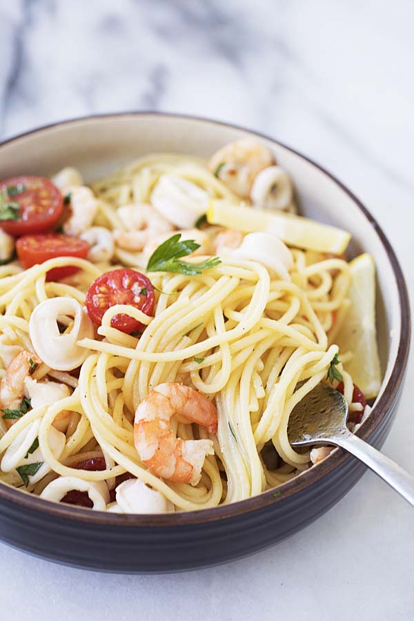 Seafood scampi served in a pasta bowl, ready to serve.