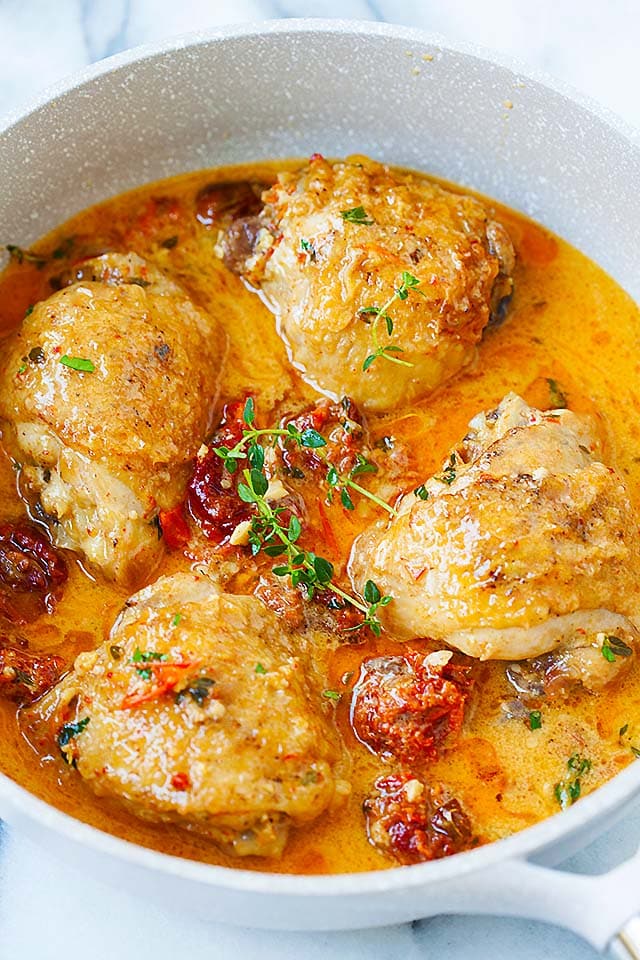 Easy homemade Sun dried tomatoes chicken thighs in creamy sauce in a serving ware.