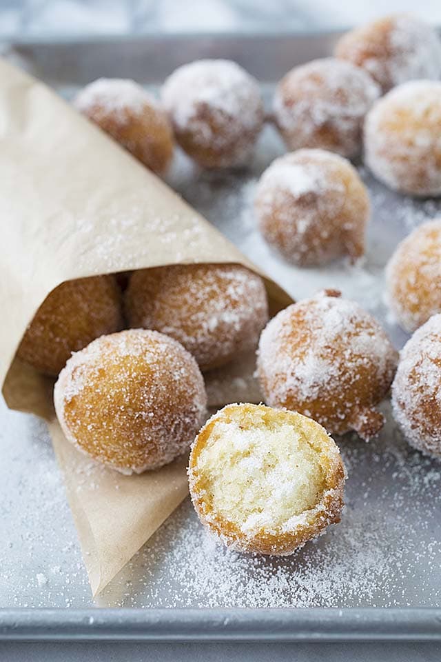 Doughnut holes rolled with sugar.