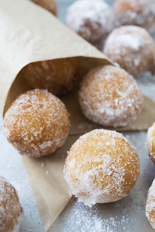 Close up of easy homemade donut holes on a serving tray.