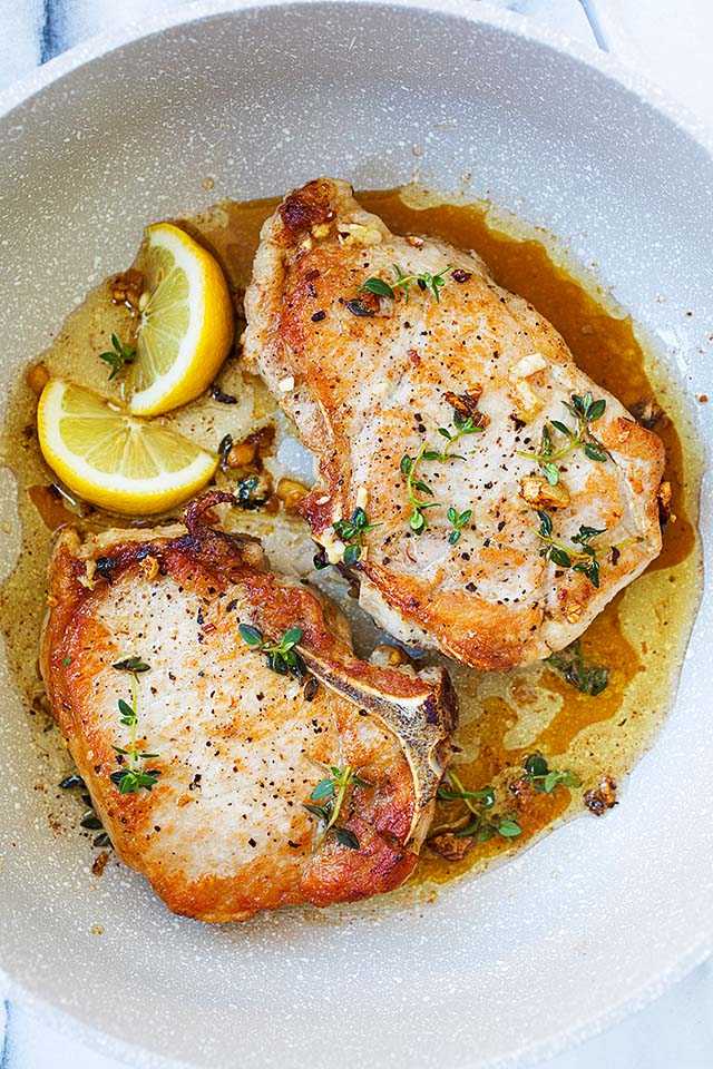 Top down photo of pan-seared pork chop, ready to be served.