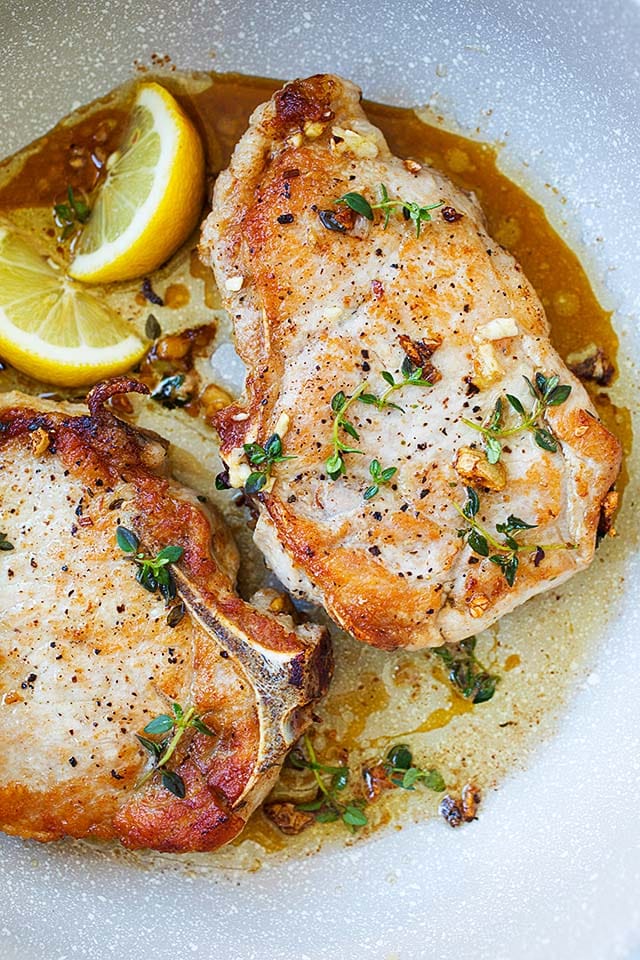 Easy pork chops with garlic, butter and thyme.