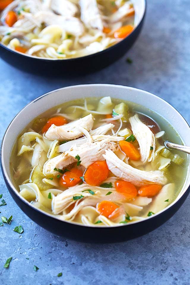 Pressure Cooker Chicken Noodle Soup in two bowls, ready to be served.