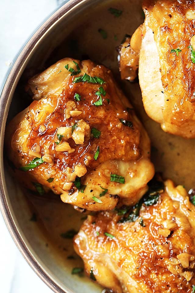 Close up of instant pot chicken thighs, with brown sugar garlic sauce.