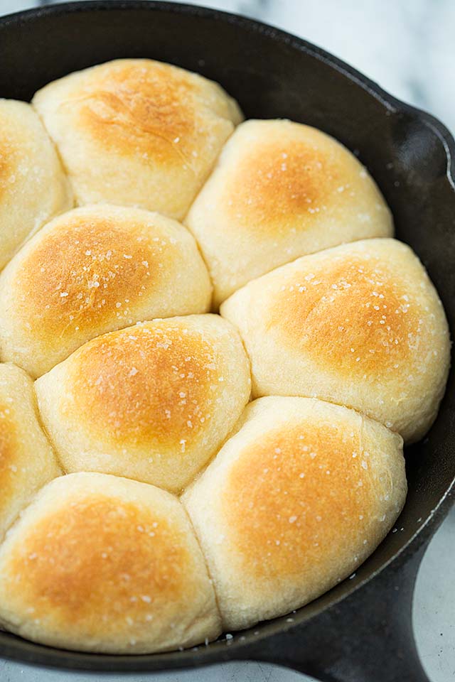 Mozzarella cheese bombs freshly baked in a cast-iron skillet ready to be served.