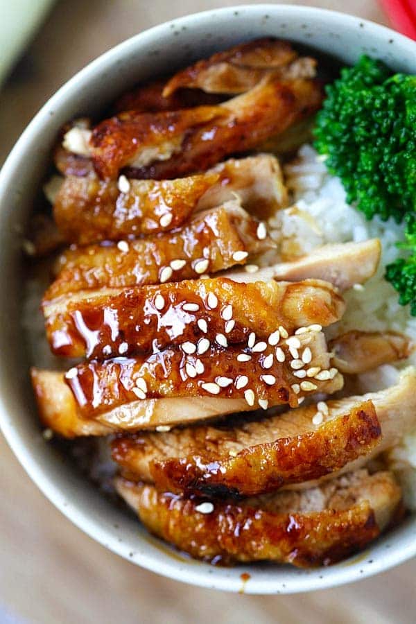 Teriyaki chicken with rice in a bowl.
