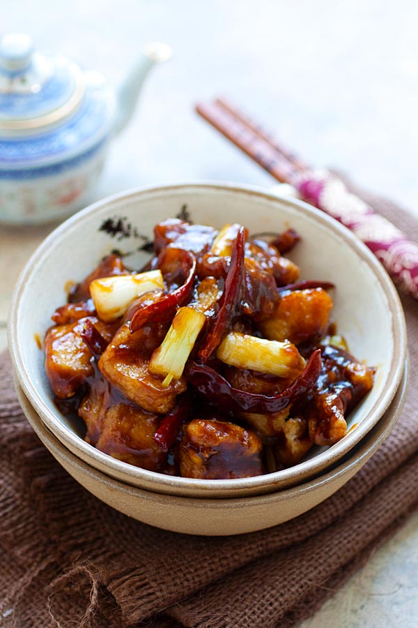 General Tso Chicken with delicious General Tso Sauce and red chilis in a bowl.