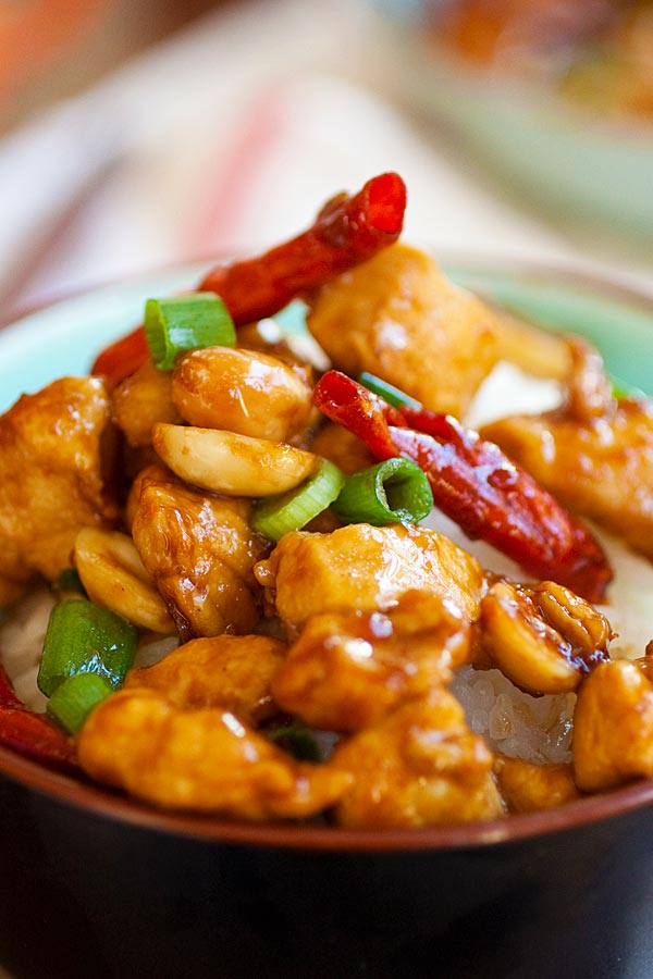 Homemade Kung Pao Chicken served in a rice bowl with steamed rice.