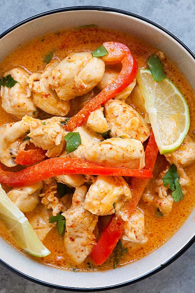 Spicy chicken curry with red curry sauce with coconut milk, served in a bowl.