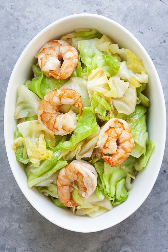 Cabbage sauteed with shrimp in a serving ware, ready to be eaten.