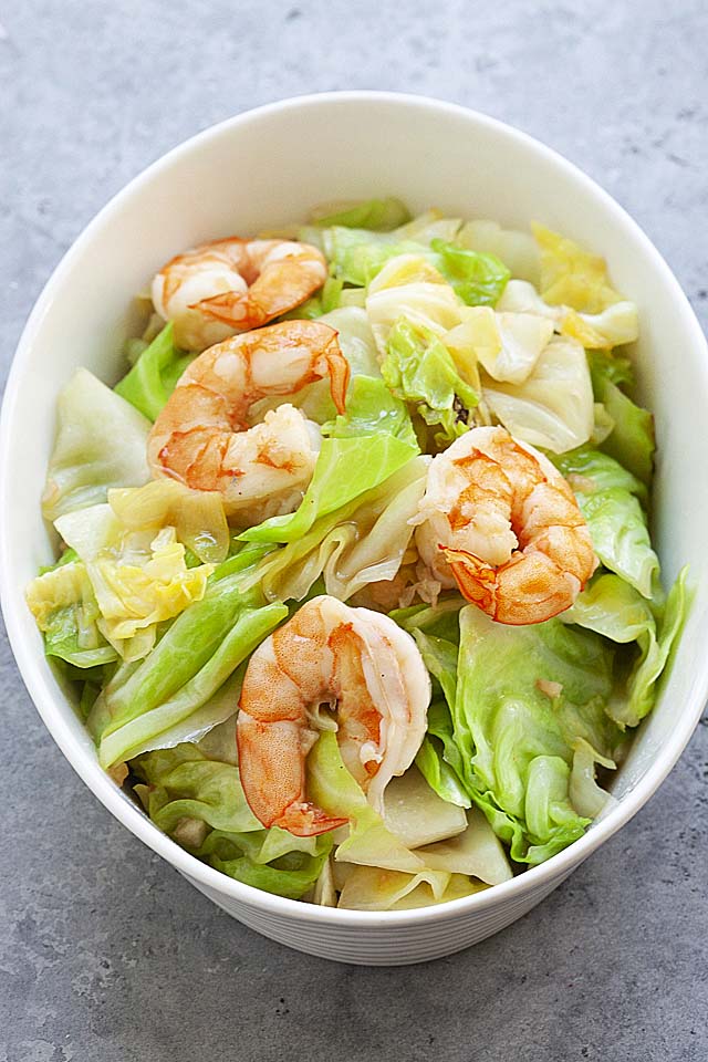 Cabbage recipe sauteed with shrimp, served in a white bowl.