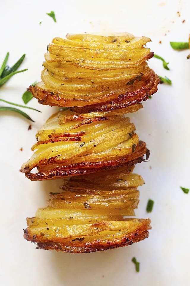 Close up of potato stacks with crispy tops and edges on the potatoes.