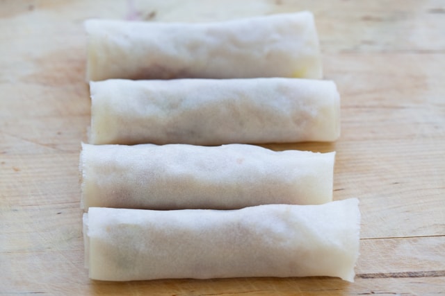 Rolled lumpia wrapped with lumpia wrapper, ready for deep-frying.